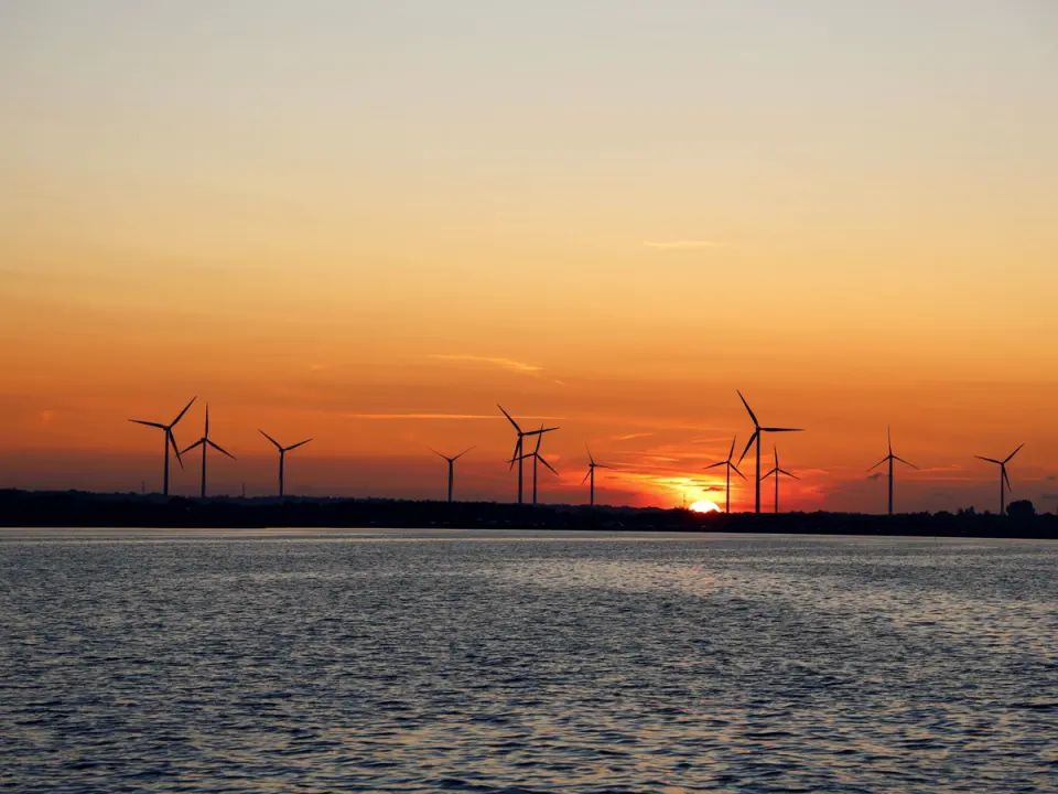 Wind turbines on the horizon at sunset